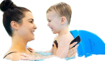 Child learning to swim with SwimFin